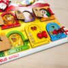 Quadro de atividades infantil Montessori para aprendizagem e desenvolvimento motor com 6 portas interativas.